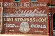 Antique Levi Strauss Overalls painted on Redmen's Hall. Jacksonville, OR.