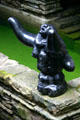 Statue on wall of Fallingwater. Mill Run, PA.