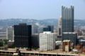 Golden Triangle skyline of Pittsburgh with black Westinghouse Tower, white National City Center & PPG Place with escarpment of Allegheny River beyond. Pittsburgh, PA.