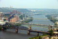 Monongahela River spanned by railroad, Liberty, 10th Street & Brady Street Bridges with Cathedral of Learning tower in distance. Pittsburgh, PA.