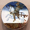 Earthenware plate with mounted knight design from Deruta & Gubbio, Italy at Carnegie Museum of Art. Pittsburgh, PA.