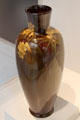 Earthenware brown vase with flowers by Kataro Shirayamadani of Rookwood Pottery at Carnegie Museum of Art. Pittsburgh, PA.