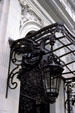 Rosecliff mansion iron phoenix holds lamp over entrance. Newport, RI.