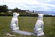 Astor's Beechwood mansion garden with stone dogs & sea. Newport, RI.