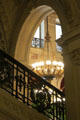 Bronze chandelier in Great Hall over stairway banister at The Breakers. Newport, RI.