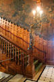 Patinated bronze torchere on Grand staircase at Chateau-sur-Mer. Newport, RI.