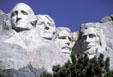 Mount Rushmore showing pine tree below. SD.