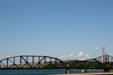 Chicago and North Western Railroad Bridge rail bridge across Missouri River with escarpment of Pierre beyond. Pierre, SD.