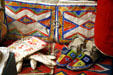 Native parfleche, gauntlets & moccasins at South Dakota State Historical Society Museum. Pierre, SD.