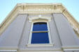 Building at Main & Spring Streets upper corner detail. Bastrop, TX.