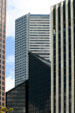 White JPMorganChase Tower above black Pennzoil Place. Houston, TX.
