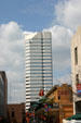 Lyric Center above heritage buildings. Houston, TX.