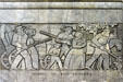 San Jacinto monument relief of Coming of the Pioneers. Houston, TX.
