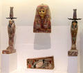 Egyptian mummy mask with companion statues & coffin painted with sacred ibis of Thoth at Museum of Fine Arts, Houston. Houston, TX.