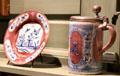 Red & blue plate & beer stein at Bayou Bend. Houston, TX.