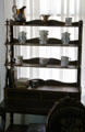 Bric-a-brac shelf at Kellum-Noble House at Sam Houston Park. Houston, TX.