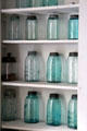 Antique canning jars at Nichols-Rice-Cherry House at Sam Houston Park. Houston, TX.