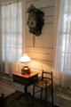Cuckoo clock over table & highchair in San Felipe Cottage at Sam Houston Park. Houston, TX.