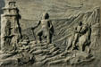 Sculpted history panel of Spaniards meeting Indians by Michael O'Brien on Texas State History Museum. Austin, TX.