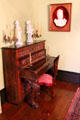 Piano with candle holders at Edward Steves Homestead Museum. San Antonio, TX.