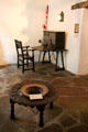 Drop-front writing desk plus brazier in Captain's office at Spanish Governor's Palace. San Antonio, TX.
