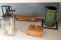 Butter churn, mold & ceramic pitcher in Fassel-Roeder House at Pioneer Museum. Fredericksburg, TX.