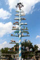 Maypole in Vereins Kirche park shows scenes related to history of Fredericksburg. Fredericksburg, TX.