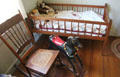 Rocking chair, child's bed & rocking horse at Sauer-Beckmann Farmstead. Stonewall, TX.
