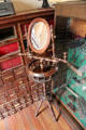 Shaving stand with mirror & adjustable candle holders at Capt. Charles Schreiner Mansion. Kerrville, TX.