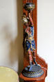 Turbaned woman ceramic statuette at Capt. Charles Schreiner Mansion. Kerrville, TX.