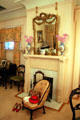 Pink bedroom fireplace & mirror at McFaddin-Ward House. Beaumont, TX.