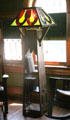 Arts & Crafts Lighting fixture with bookshelves on third floor at McFaddin-Ward House. Beaumont, TX.