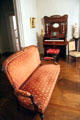 Organ & settee in parlor at McCulloch House. Waco, TX.