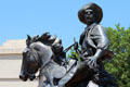 Detail of trail boss at Chisholm Trail sculpture. Waco, TX.