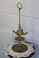 Three wick whale oil burning brass lamp at John Jay French Museum. Beaumont, TX.