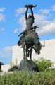 Invocation bronze equestrian sculpture of Indian by Buck McCain at Stark Museum of Art. Orange, TX