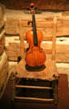 Side chair with rawhide seat & fiddle at Bullock Texas State History Museum. Austin, TX.