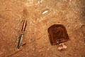 Battle debris embed in pavement before reproduction of Alamo at Bullock Texas State History Museum. Austin, TX.