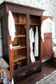 Clothing cupboard in Muenzler House at Pioneer Village. Gonzales, TX.