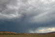 Landscape with rain in distance north of Monticello along Highway US191 south of Moab. UT.