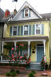 360 Middle St. yellow clapboard with blue shutters. Portsmouth, VA.