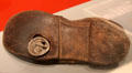Civil War shoe with piece of artillery shell embedded during Battle of Gettysburg at Vermont History Museum. Montpelier, VT.
