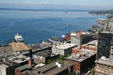 Olympic Mountain Range & Seattle waterfront from Columbia Center Sky View. Seattle, WA.