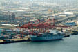 Cosco ship loading in Seattle Container Port. Seattle, WA.