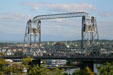 Murray Morgan Lift Bridge across Thea Foss Waterway frames Mt. Rainier. Tacoma, WA.