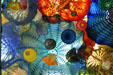Blown glass forms by Dale Chihuly in ceiling of Seaform Pavilion bridge. Tacoma, WA.