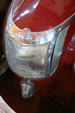 Square headlight of Graham Custom Supercharged at LeMay Museum. Tacoma, WA.