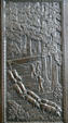 Panel of oxen pulling trees out of forest on bronze doors of Washington State Capitol. Olympia, WA.