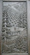 Panel of settler's farm on bronze doors of Washington State Capitol. Olympia, WA.
