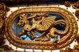 Carved knight battling dragon on circus wagon at Circus World Museum. Baraboo, WI.